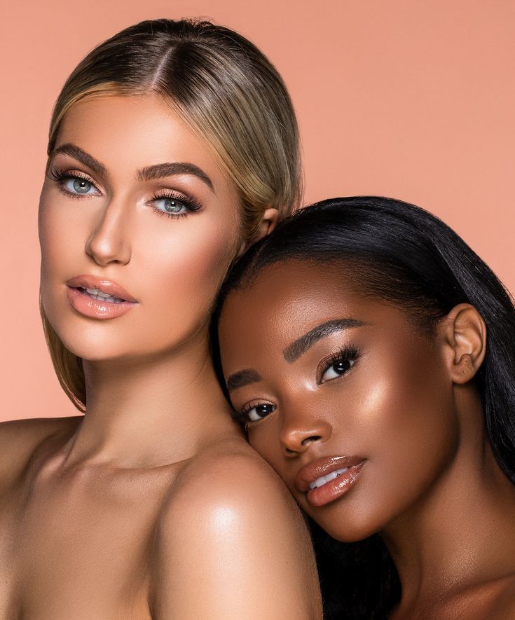 Makeup artist working on client